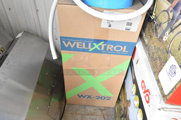 WellXtrol WX-202 tanks in original packaging, professional-grade water system components, new condition. Buyer pickup only.