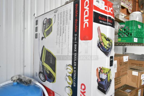 BRAND NEW Cyclic Double 2 in 1 Bike Trailer & Stroller in original box. Features dual use, durable design, easy conversion.