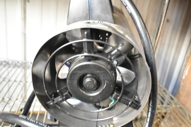 Mr Heater propane gas-powered heater, circular fan design, visible black tubing, appears in good condition, compact size.