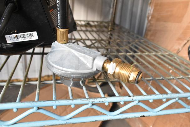 Mr Heater propane gas powered heater, showing brass connector and regulator. In good condition, barcode visible.
