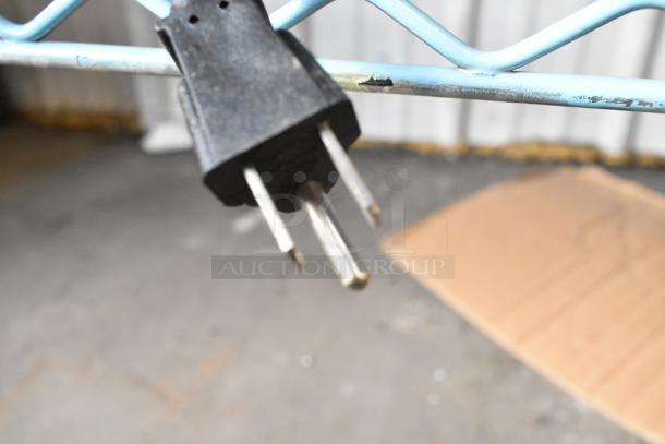 Close-up of a plug on a Mr Heater Propane Gas Powered Heater, emphasizing its power connection aspect.