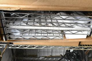 Brand new wire shelf set, model B0B3CCQKHR, in original box. Includes two shelves, packaged with protective materials.