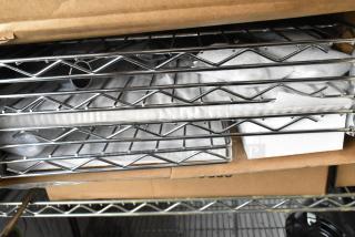 Boxed brand new wire shelf set B0B3CCQKHR. Chrome finish, packaged in original box, protective materials included.