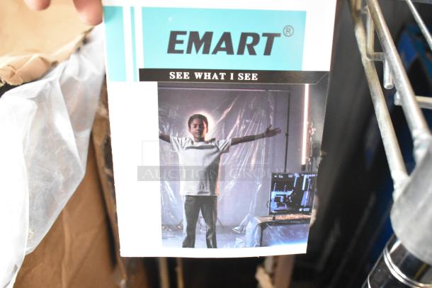 Brand new Emart photography backdrop, featuring packaging with child photo and "See What I See" text.