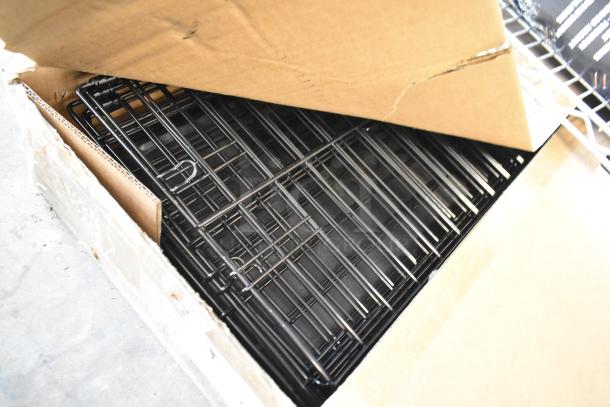 Brand new black 3-tier cat cage playpen in a cardboard box. Unused, pristine condition, metal wire construction.
