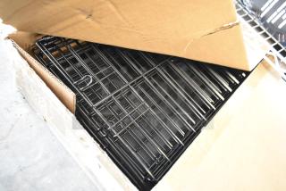 Brand new black 3-tier cat cage playpen in a cardboard box. Unused, pristine condition, metal wire construction.