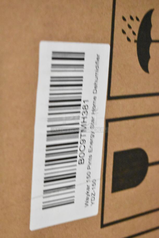 Brand new Waykar YDZ-150 dehumidifier in original box, featuring Energy Star label. Barcode visible for model verification.