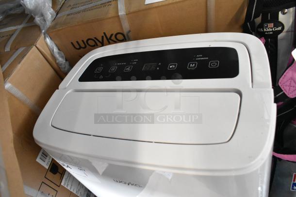 Brand new Waykar YDZ-150 dehumidifier in packaging, digital control panel visible, pristine condition.