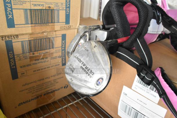 US Kids Golf pink golf bag with 3 clubs, including US Kids Ultra Light driver. Good condition, ideal for young golfers.