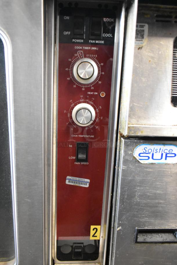 Southbend stainless steel commercial convection oven control panel with power, fan mode, cook timer, and temperature settings.