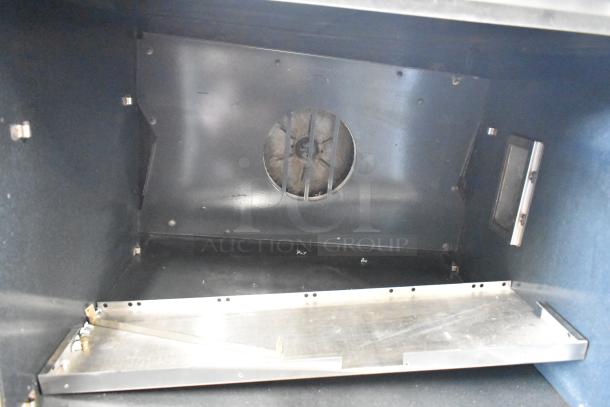 Southbend stainless steel convection oven interior, showing fan and clean surfaces, ideal for commercial use with thermostatic controls.