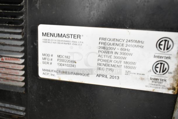 Menumaster MDC182 commercial microwave oven label showing model number, power specifications, and manufacturing date.