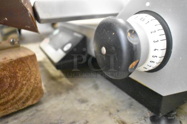2020 Bizerba GSP HD stainless steel meat slicer, commercial countertop model. Features adjustable slice thickness knob.