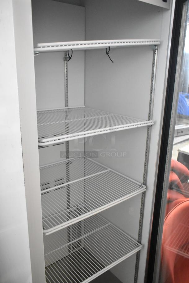 2019 Habco SE18 commercial cooler with single glass door, four poly-coated racks, metal exterior, 115 volts, 1 phase.