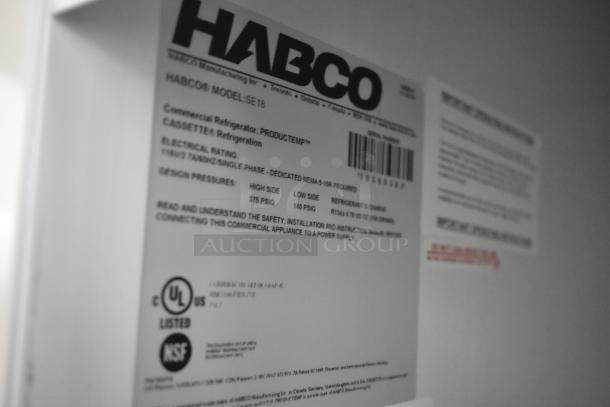 Close-up of a label on the 2019 Habco SE18 Commercial Cooler. Shows model and power details for this single door reach-in unit.