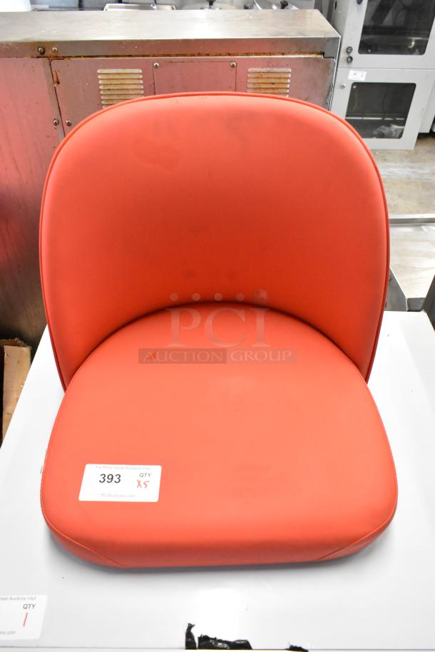 Brand new red bucket seat style stool seat without frame, tag indicating “393 QTY x5.”
