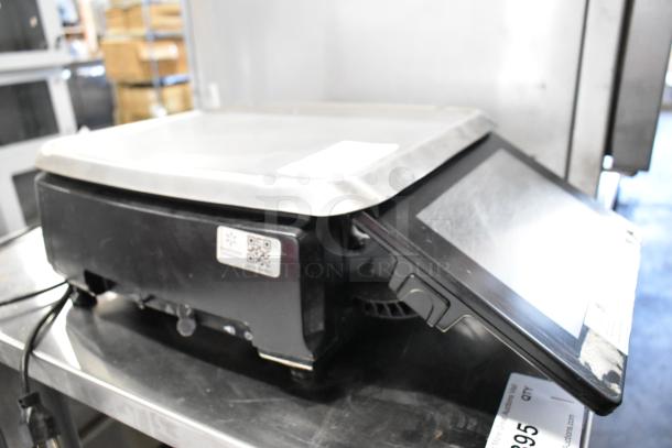 2016 Hobart HTi metal commercial countertop food portioning scale. Features digital display, in good condition. 120/208-240V.
