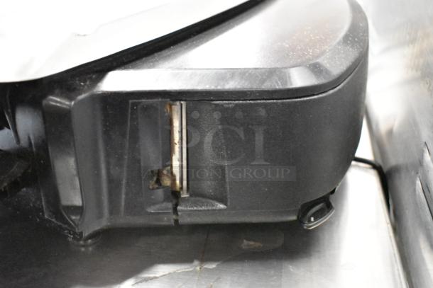 2016 Hobart HTi Metal Commercial Countertop Food Portioning Scale, side view showing compact design and metal surface.