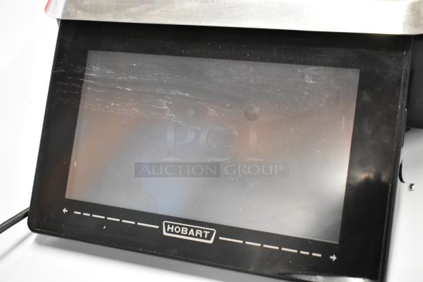 2023 Hobart HTi metal countertop food portioning scale with touchscreen display; slightly scratched, dual voltage, 1 phase.