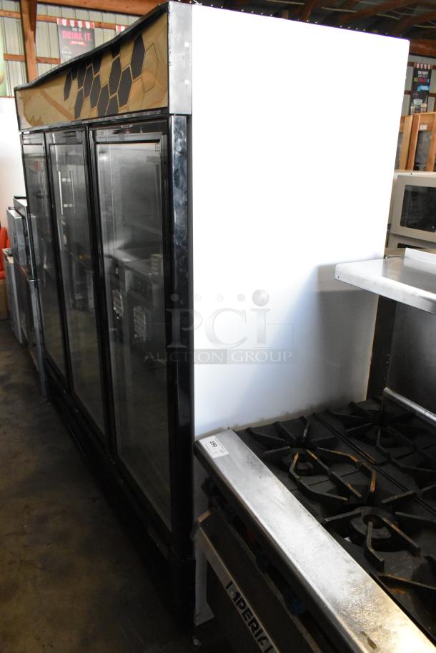 2018 Migali C-72FM 3 Door Commercial Freezer Merchandiser with poly coated racks. 115/208-230V, 1 Phase, good condition.
