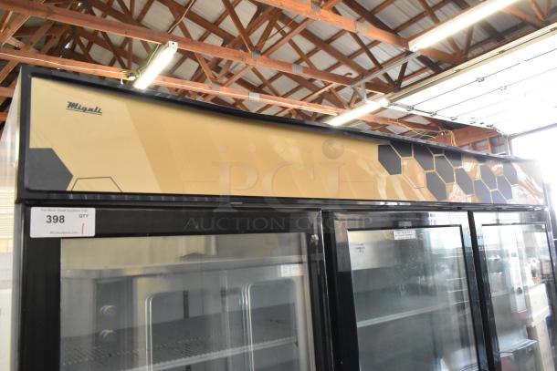 2018 Migali C-72FM commercial 3-door freezer with poly-coated racks, model C-72FM, 115/208-230V, 1 phase.