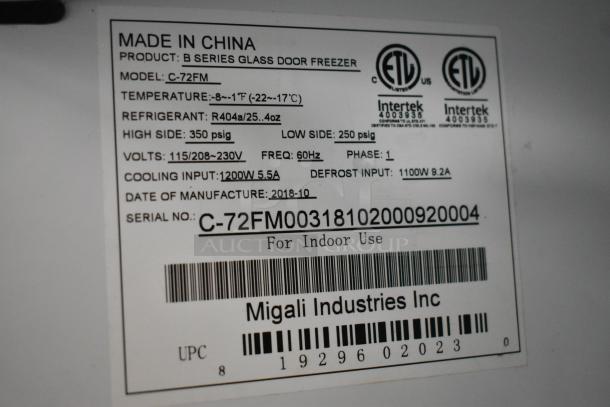 2018 Migali C-72FM 3 Door Freezer, 115/208-230V, poly coated racks, label shows model details and manufacturing info.