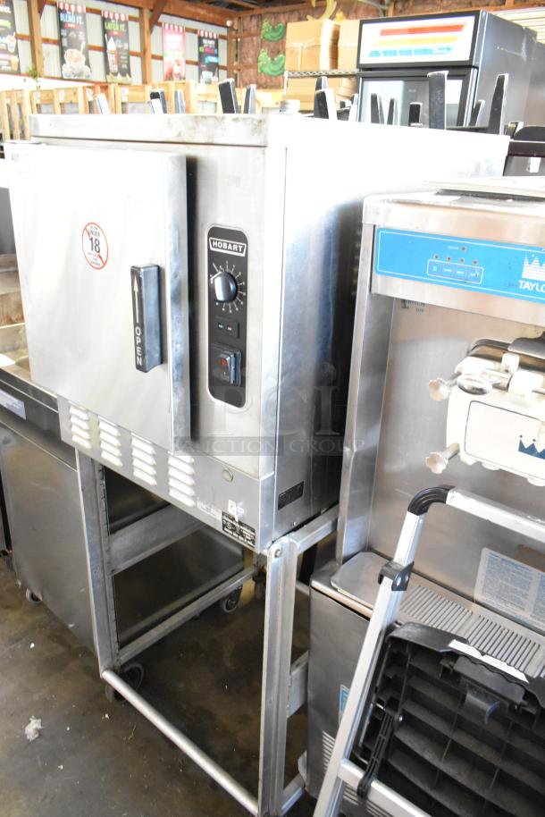 Hobart HC24EA5 stainless steel single deck steam cabinet, electric, 208/240 volts, 1/3 phase, with control panel and stand.
