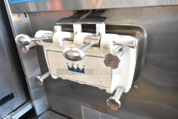 Taylor 754-27 stainless steel 2-flavor soft serve machine, floor style, twist option, commercial casters, 208-230V, 1 phase.