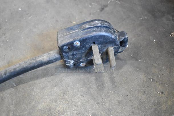 The image shows a worn electrical plug and cord for a Taylor 754-27 soft serve ice cream machine.