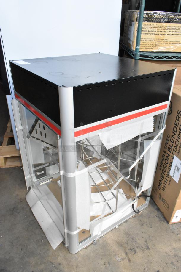 Brand new Hatco FSDT-2 Flav-R-Savor holding cabinet. Scratch and dent. Features four-tier circle rack, dual glass doors.