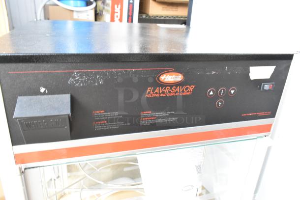 BRAND NEW Hatco FSDT-2 Flav-R-Savor display cabinet with four-tier rack, scratches visible, 120V, one phase.