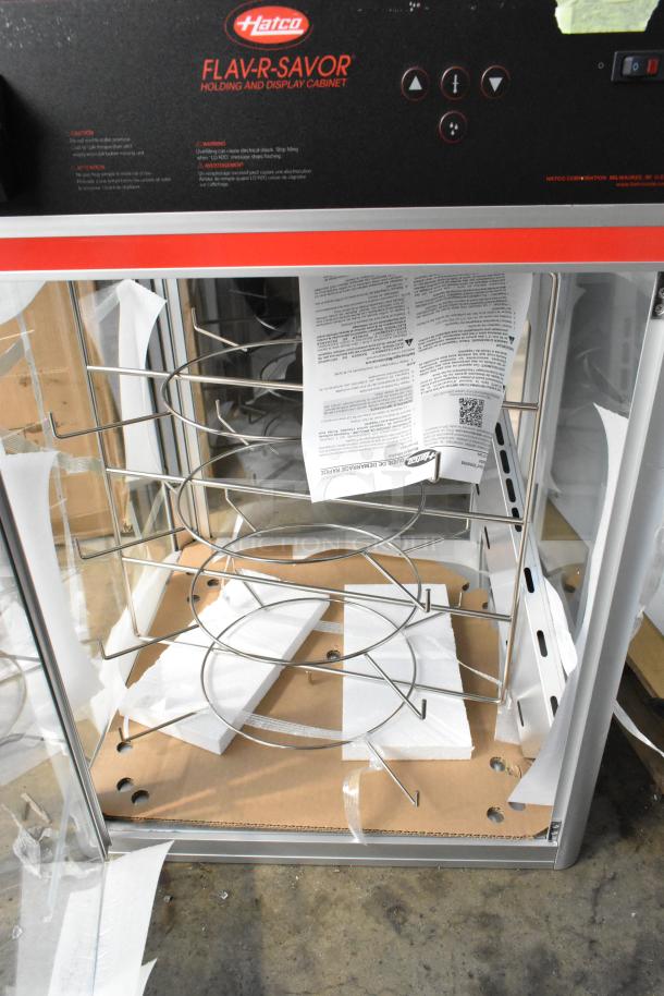 Brand new Hatco FSDT-2 Flav-R-Savor cabinet with four-tier rack. Scratch and dent condition. 120V, 1 phase.