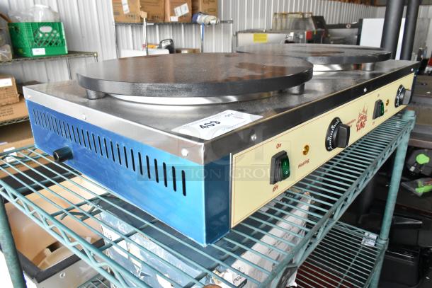 Brand new Carnival King 382TCM16DBL 16" dual non-stick crepe maker, 208/240 volts, 1 phase, slight scratch on surface.