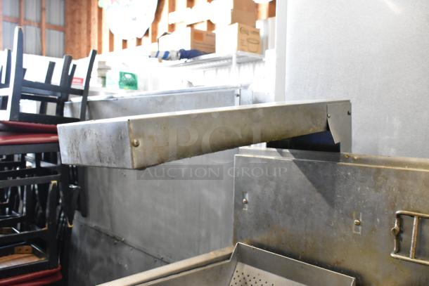 Frymaster FMPH255CSC stainless steel commercial 2-bay deep fat fryer with filtration system and dumping station, 80,000 BTU.