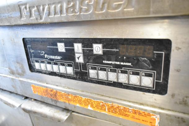 Frymaster FMPH255CSC commercial fryer control panel, stainless steel, used condition, visible buttons and warning label.