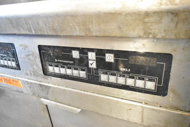 Frymaster FMPH255CSC stainless steel fryer control panel, features buttons and displays, some wear visible.
