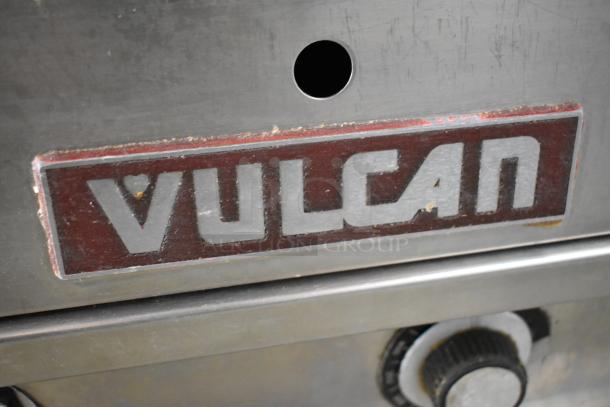 Vulcan stainless steel commercial countertop griddle with thermostatic controls, featuring visible branding logo.