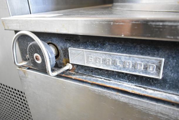 Garland KT40S-M stainless steel 40-gallon steam kettle, commercial, floor style, visible wear on metal, Garland logo plate.