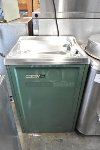 Halsey Taylor metal commercial floor water fountain, green finish, 115V, 1 phase, stainless steel top, used condition.