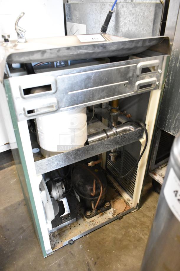Halsey Taylor metal commercial floor water fountain, 115V, 1 Phase, partially disassembled showing internal components.