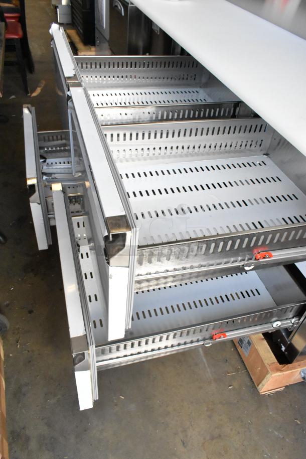 BRAND NEW Avantco 178SSPPT2 stainless steel pizza prep table with 4 drawers, 115V, 1 phase, scratch and dent condition.