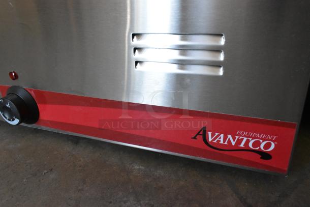 Brand new Avantco 177FW200D dual well electric food warmer with thermostatic controls, 120V, stainless steel with minor scratches.