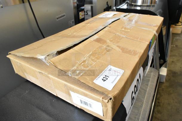 Cardboard box labeled "Chavito Candy Rack," showing signs of wear and tear, new item with auction tag number 431.