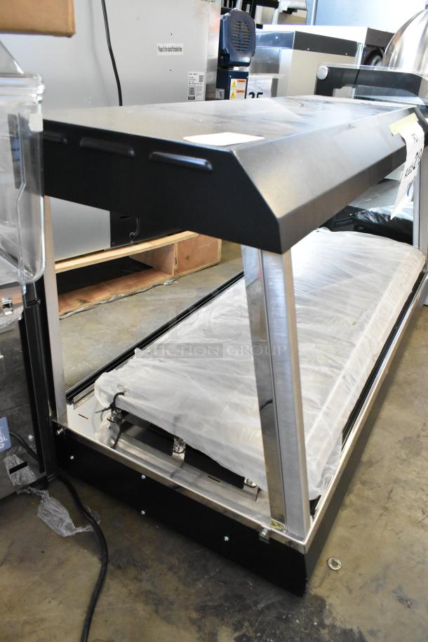 Brand new Vollrath FMA7048 48" hot food merchandiser, 120 volts, 1 phase. Scratch and dent condition.