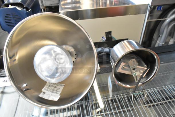 Brand new Hanson Brass 800-RET-SS-120 retractable heat lamp, stainless steel finish, with scratch and dent. 120V, 1 Phase.
