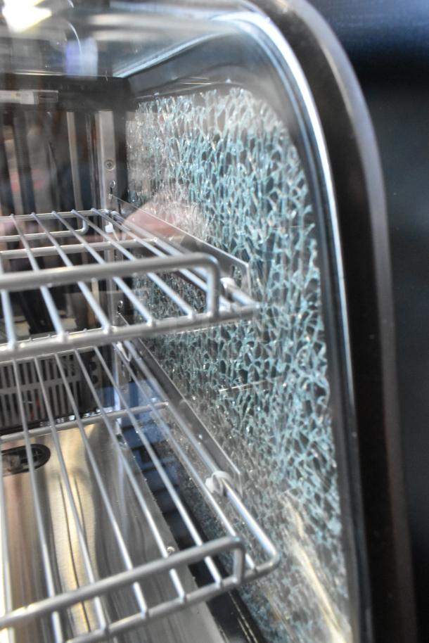 KoolMore countertop merchandising case, metal with broken glass on side pane, new, scratch-and-dent condition.