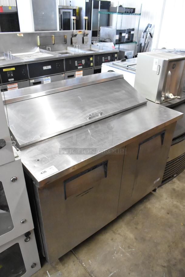 True TSSU-48-12 stainless steel sandwich salad prep table, commercial casters, 115V, 1 phase, excellent condition.