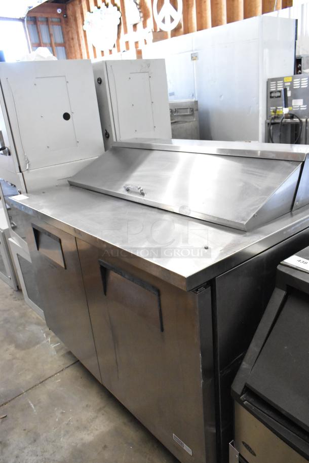 True TSSU-48-12 stainless steel sandwich salad prep table. Features bain marie mega top, commercial casters. 115V, 1 phase.