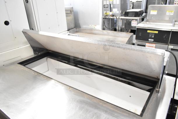 TErue TSSU-48-12 stainless steel sandwich prep table; bain marie top, badged, on casters; 115V, 1 phase; good condition.