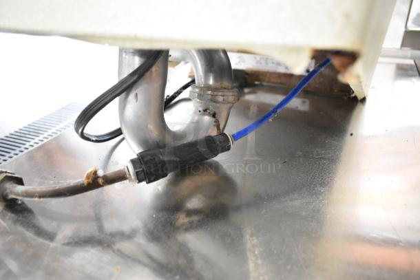 Elkay HEW3_1H metal wall mount water fountain base, visible pipes and wiring, 115 volts, 1 phase configuration.